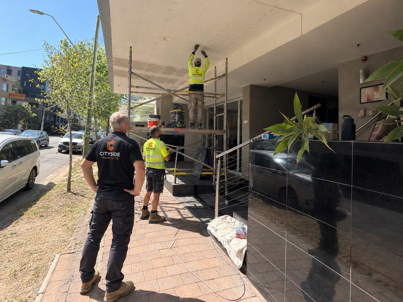 City Side team supervising soffit works from mobile scaffold