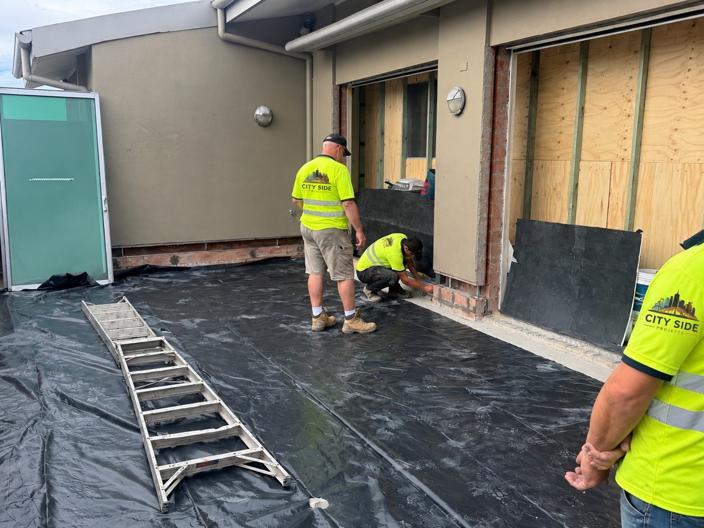 City Side crew preparing terrace for waterproofing