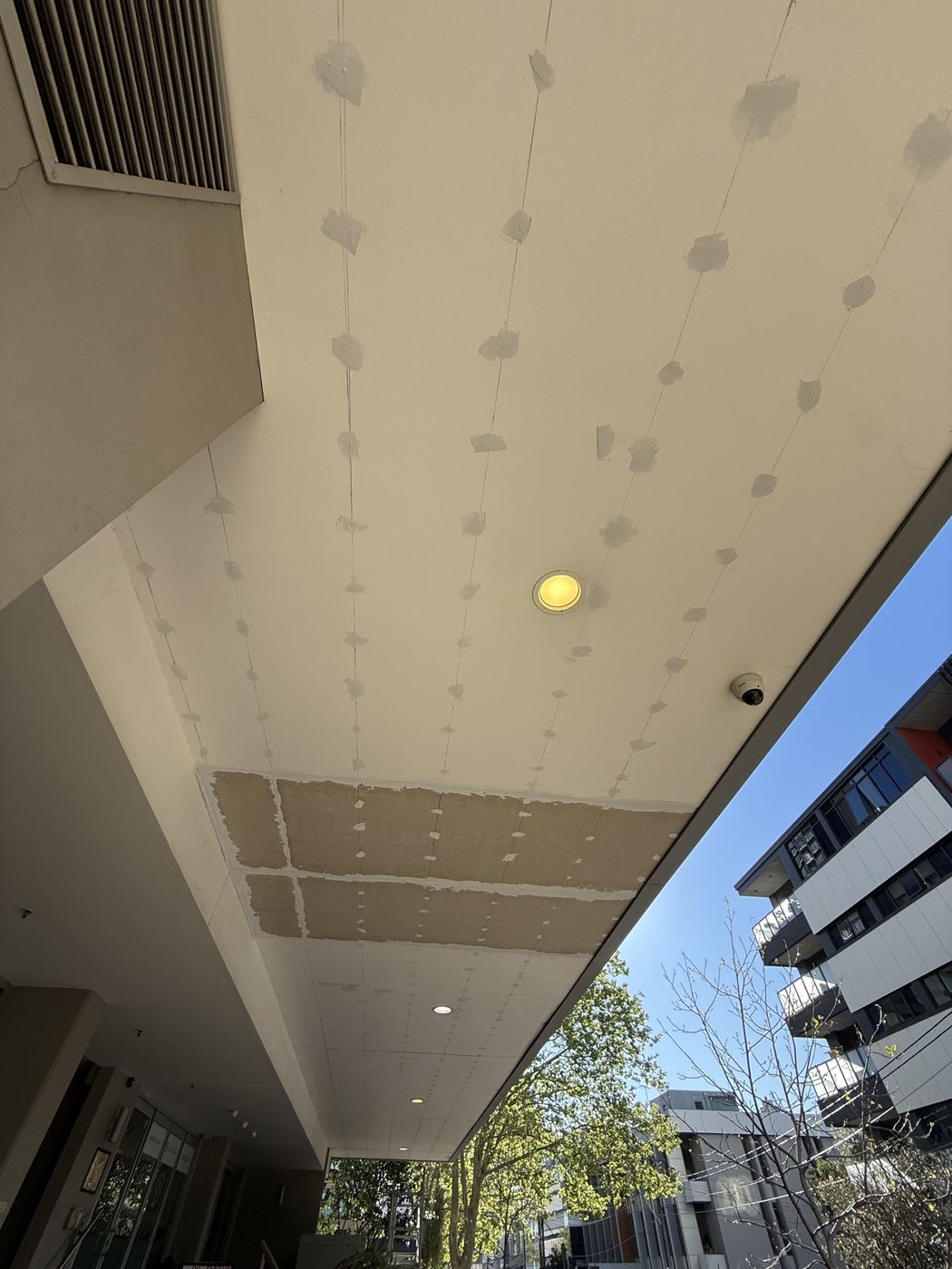 Sheeted awning soffit with fixings set