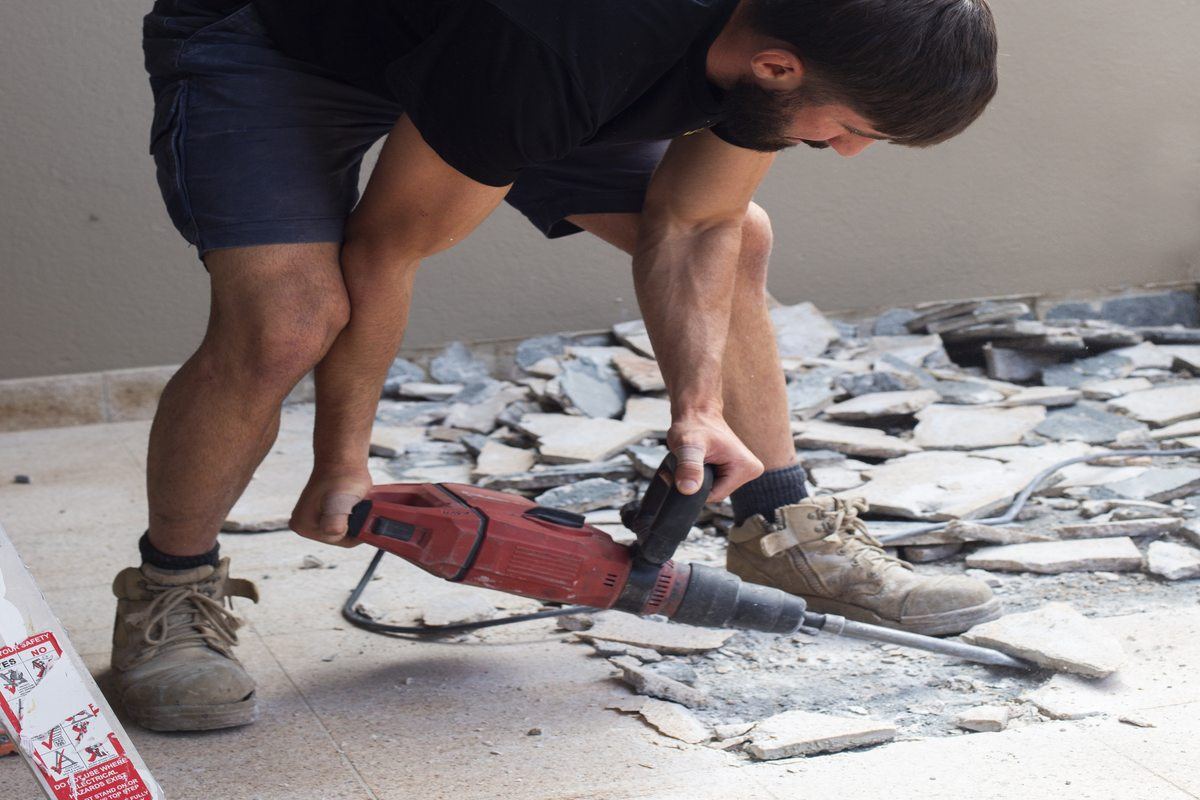 Floor tile demolition to substrate