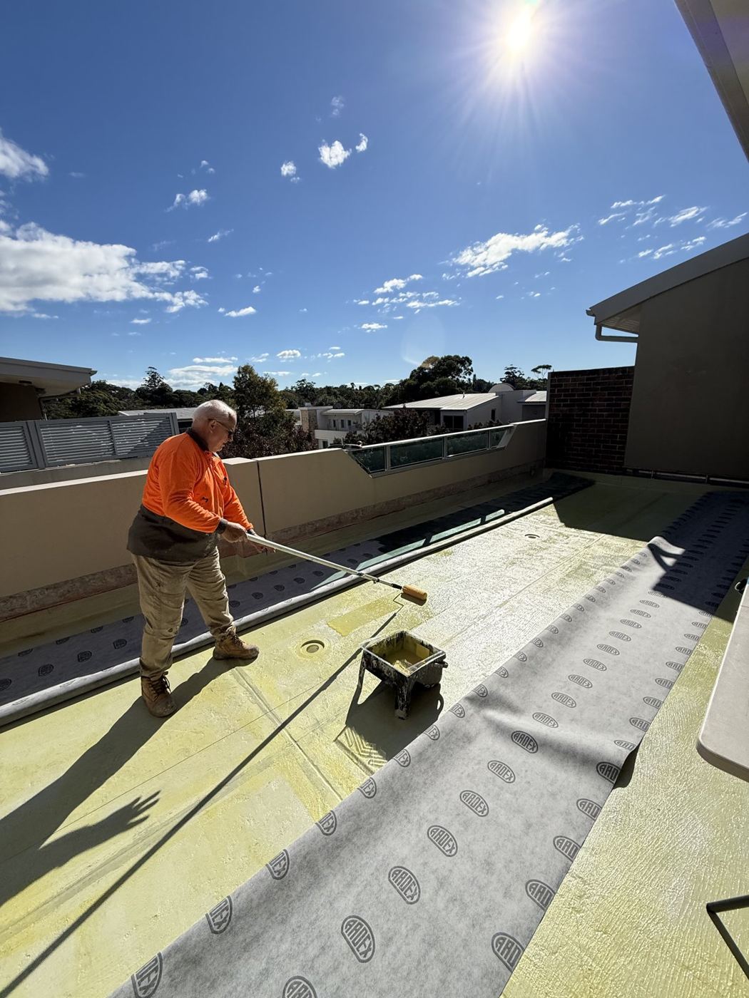 Priming substrate and laying sheet membrane