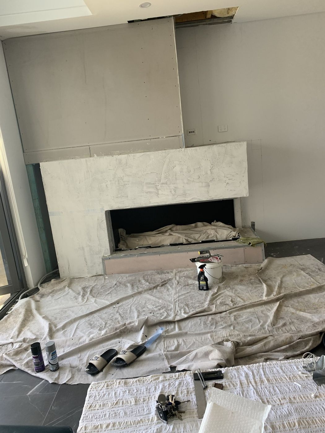 Fireplace surround under construction Monterey