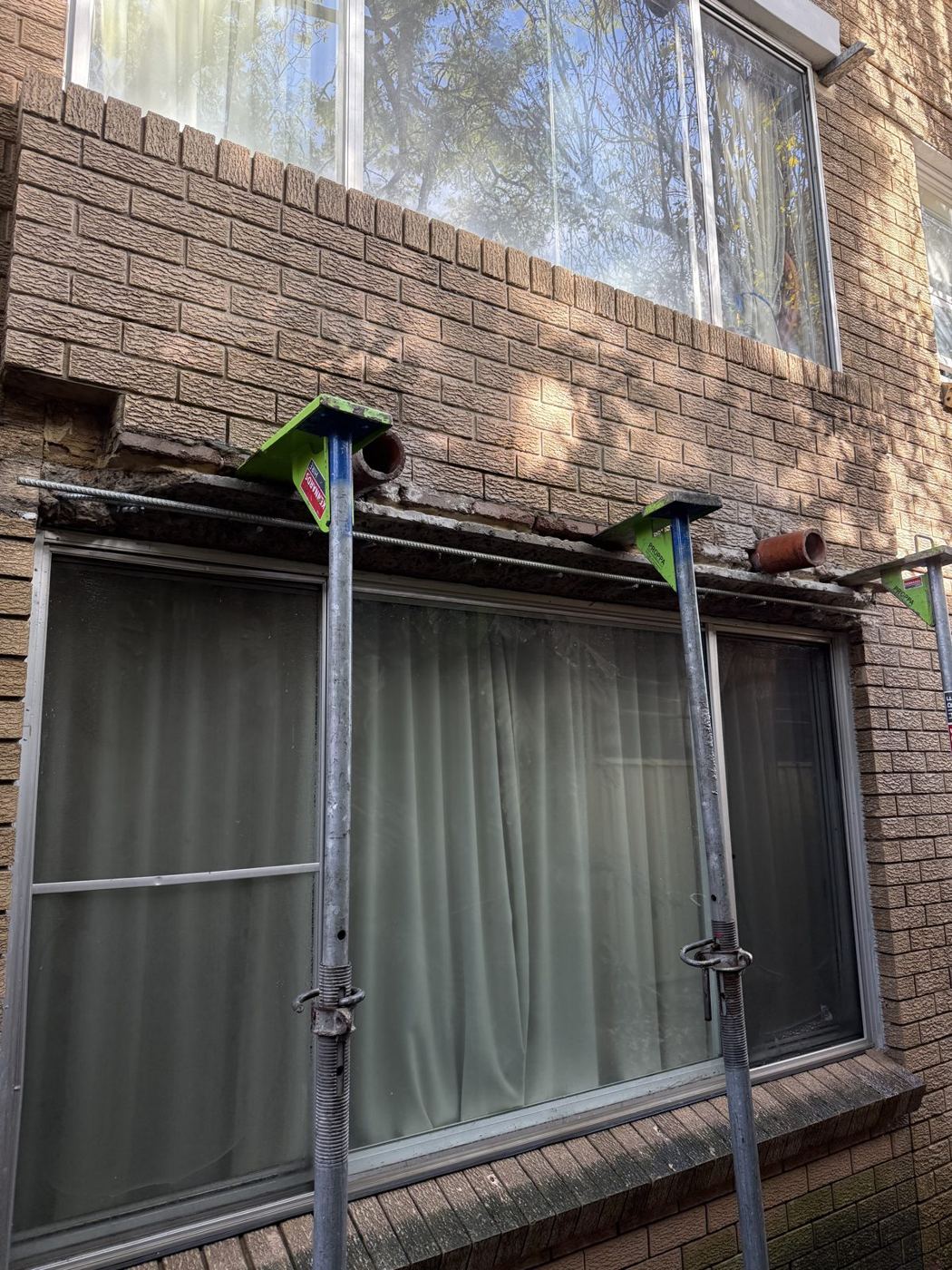 Window opening propped during lintel works
