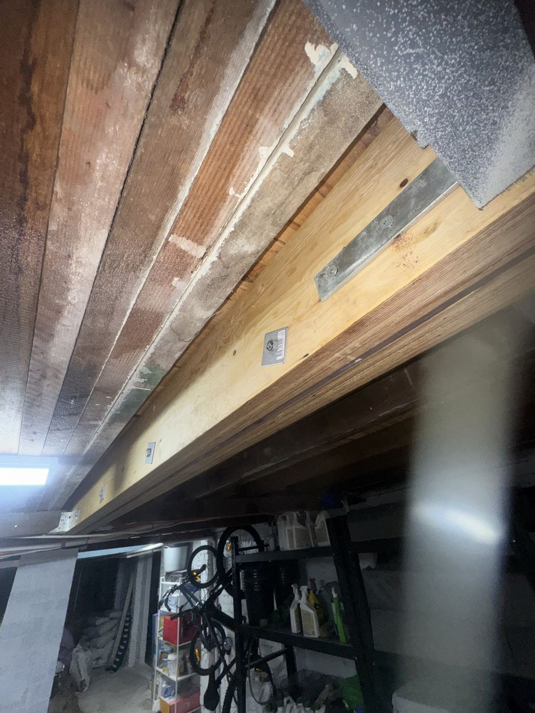 Flitch beam installed with engineered connections