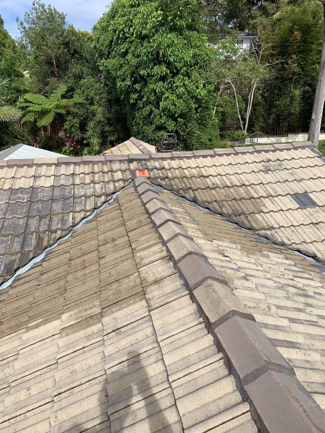 Tile roof repairs to unit building North Sydney