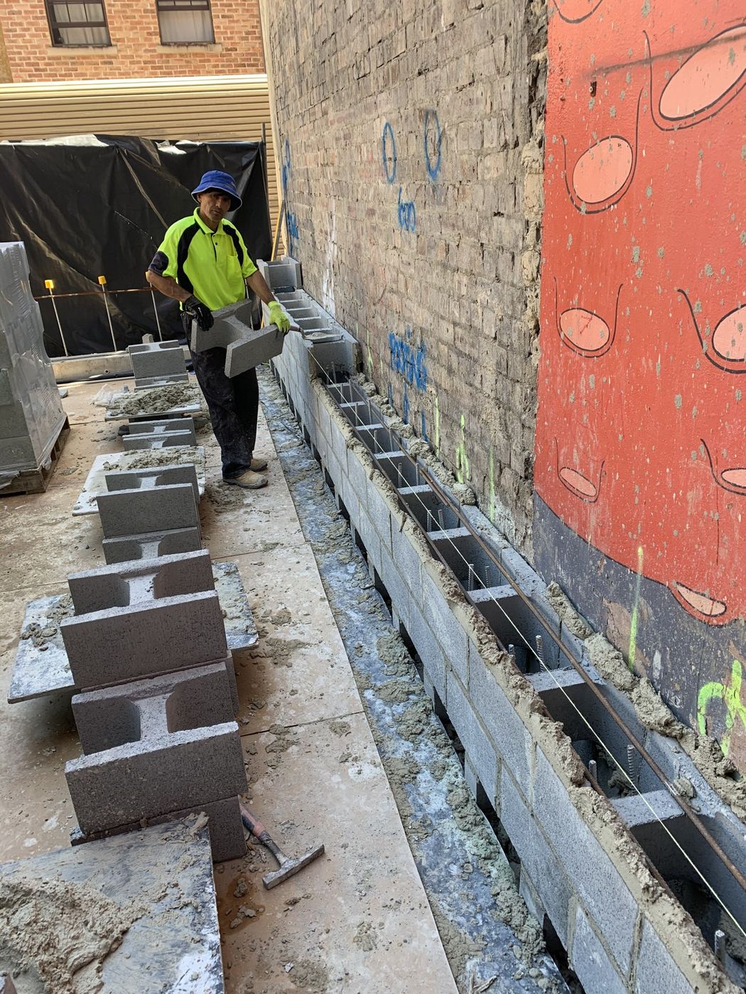 Block retaining wall under construction Darlinghurst