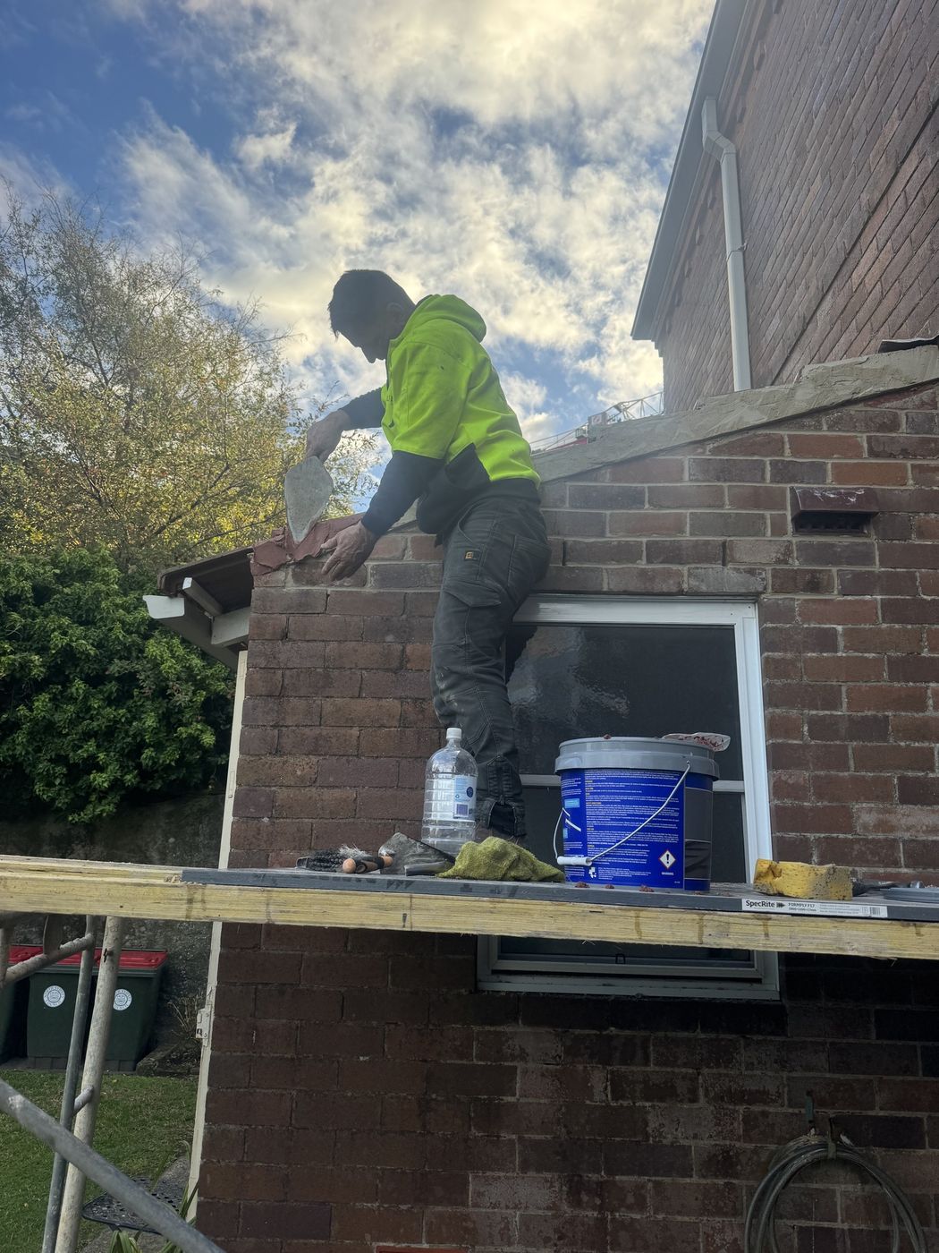 Brick repointing from scaffold