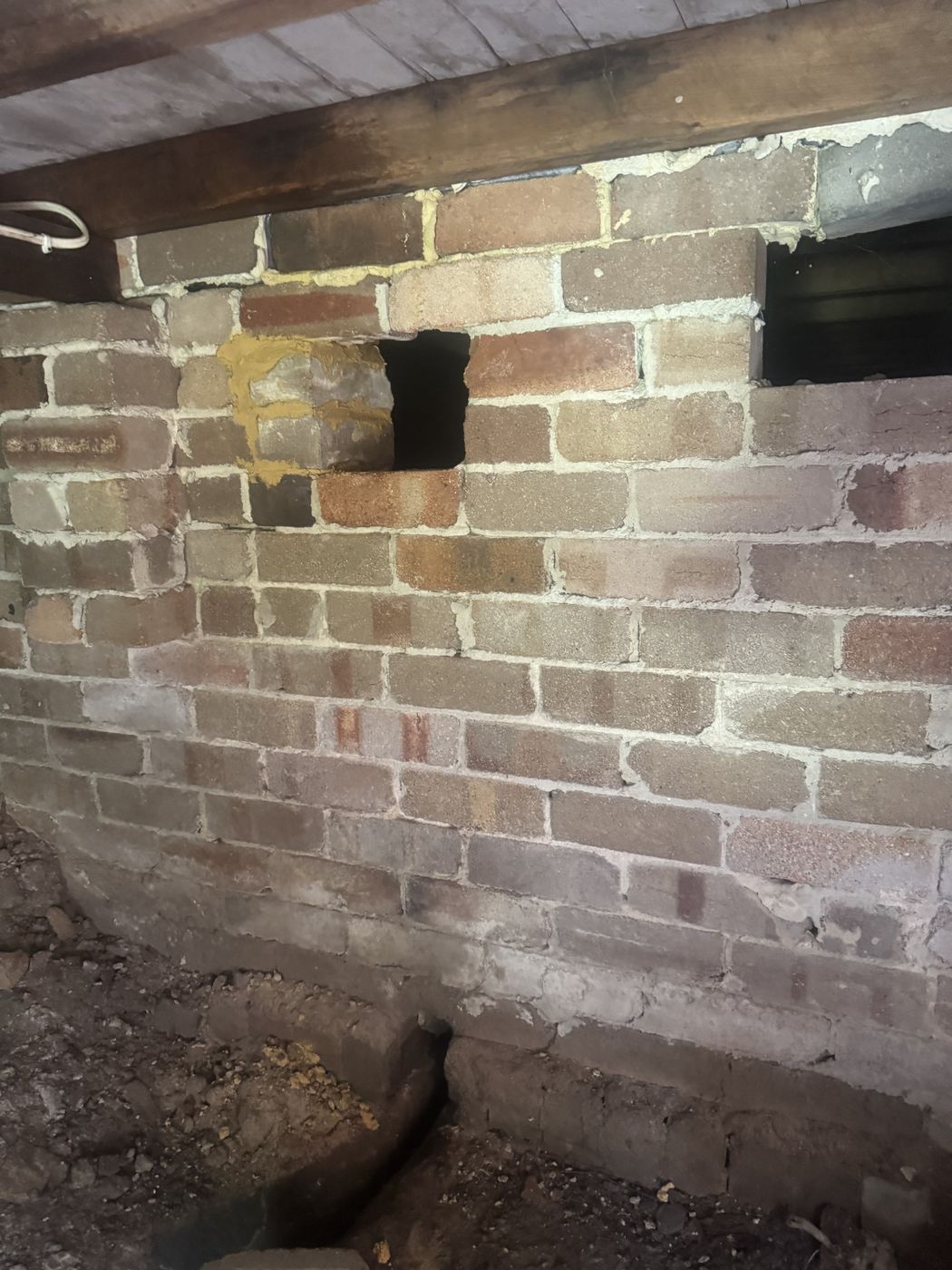 New vent openings through subfloor brickwork